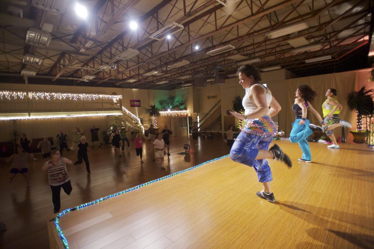 Guests participate in a free Zumba class at a recent weekly Vancouver RVLution meeting at Vamanos Studio in Vancouver.