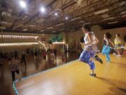 Guests participate in a free Zumba class at a recent weekly Vancouver RVLution meeting at Vamanos Studio in Vancouver.