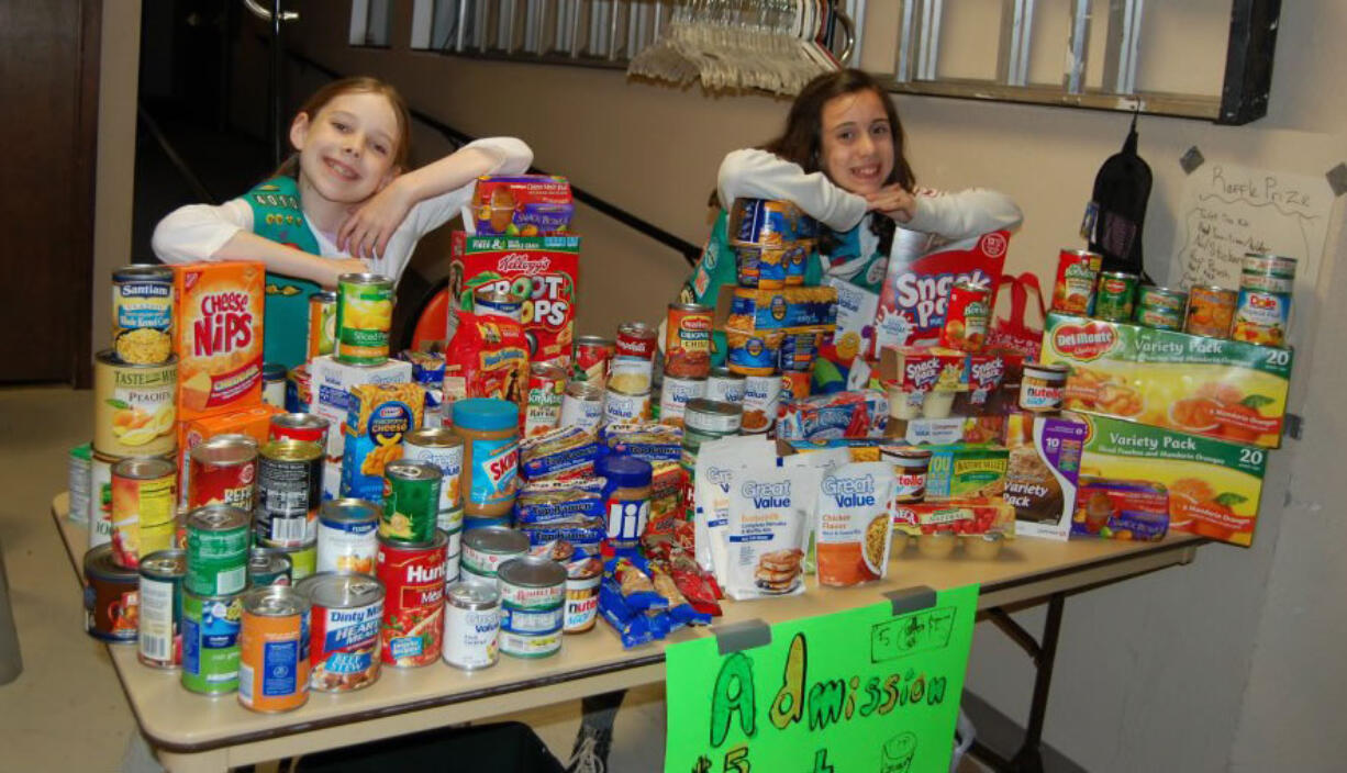 West Hazel Dell: Kayl Peck, left, and Beth Castellani-Kelsay got the goods to share.