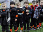 Players of the Salmon Creek Little League played their first game at the new Luke Jensen Sports Park Saturday.