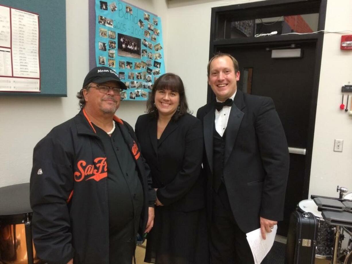 Brush Prairie: Tower of Power founder Mic Gillette, left, with Washougal High School band leader Kelly Ritter and Hockinson High School band leader Corey McEnry in October 2014, when the trumpet and trombone player joined the two schools for a concert.