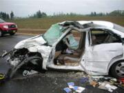 MARION COUNTY, ORE., SHERIFF'S OFFICEA woman's 2004 Honda Civic sits devastated Tuesday after she lost control and lurched into the path of a 2007 Chevrolet Silverado northwest of Donald,Ore.