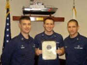 Salmon Creek: Boatswains Mate Second Class Jim Farian receiving his certificate as Coast Guard Station Depoe Bay Sailor of the Quarter for the fourth quarter of 2011.