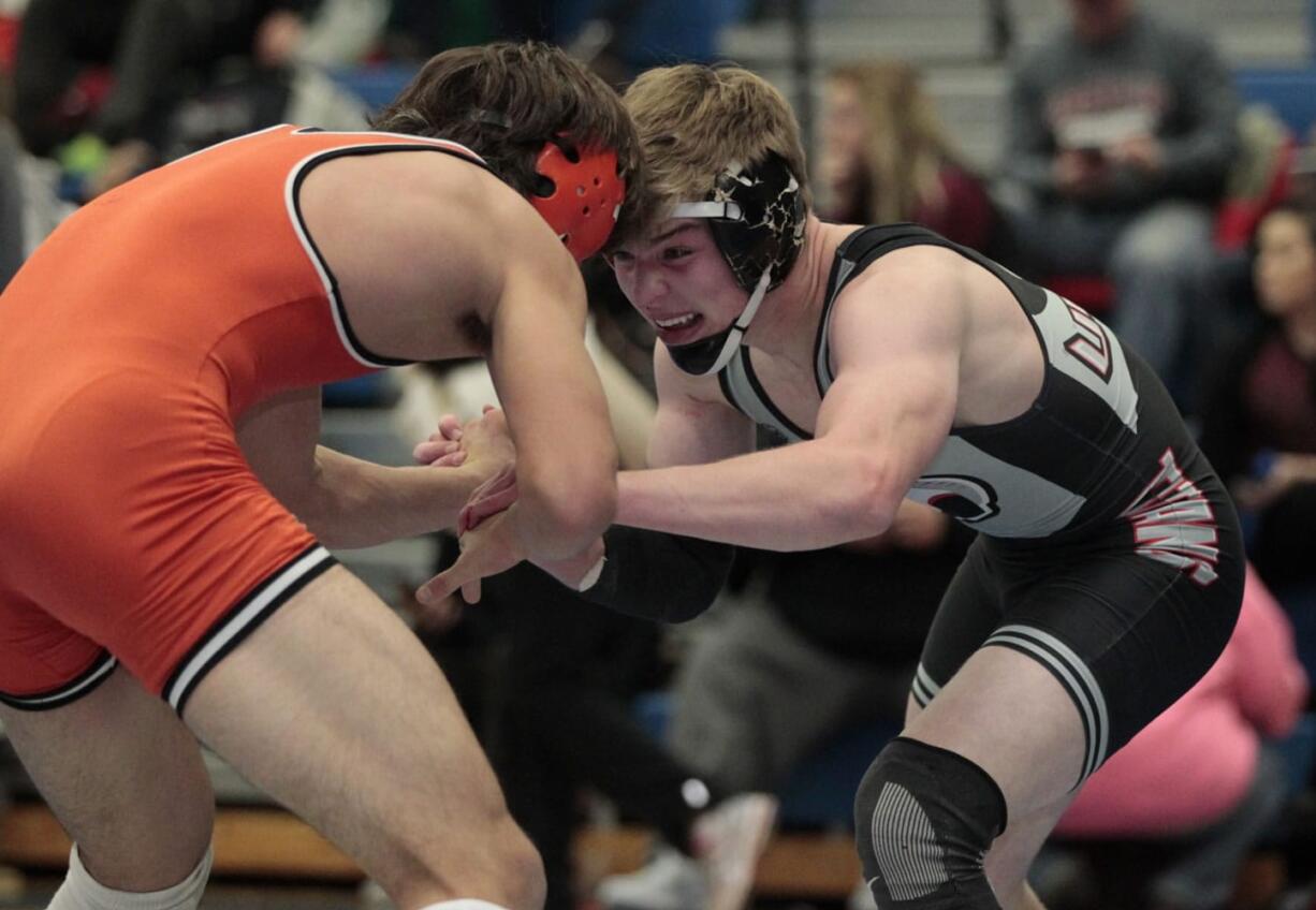 Tommy Strassenberg (right) of Union wrestles Tanner Earhart of Dallas in the 160 lbs. class at the Pacific Coast Wrestling high school tournament.