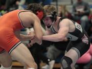 Tommy Strassenberg (right) of Union wrestles Tanner Earhart of Dallas in the 160 lbs. class at the Pacific Coast Wrestling high school tournament.