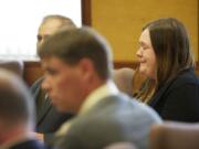 Alayna Higdon reacts Tuesday when a Clark County jury acquitted her and John Eckhart of unlawful imprisonment in connection with their practice of locking Eckhart's two autistic sons in a bedroom secured with a cage-like door.