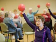 Cathy Lauder leads an exercise class for people with Parkinson's disease at Vancouver's The Quarry Senior Living.