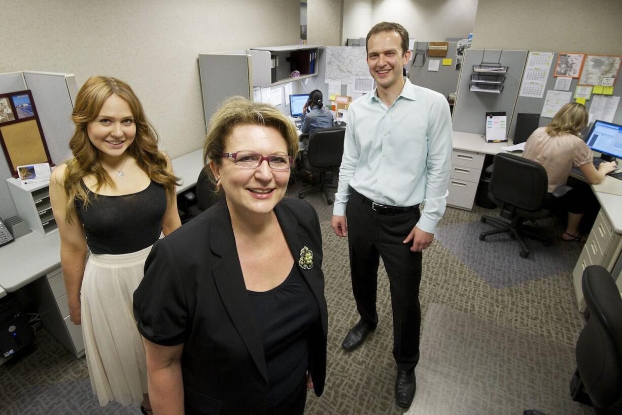 Elena Lawler, center, launched Northwest Interpreters Inc. in 1992 after arriving in Vancouver from Kazakhstan.