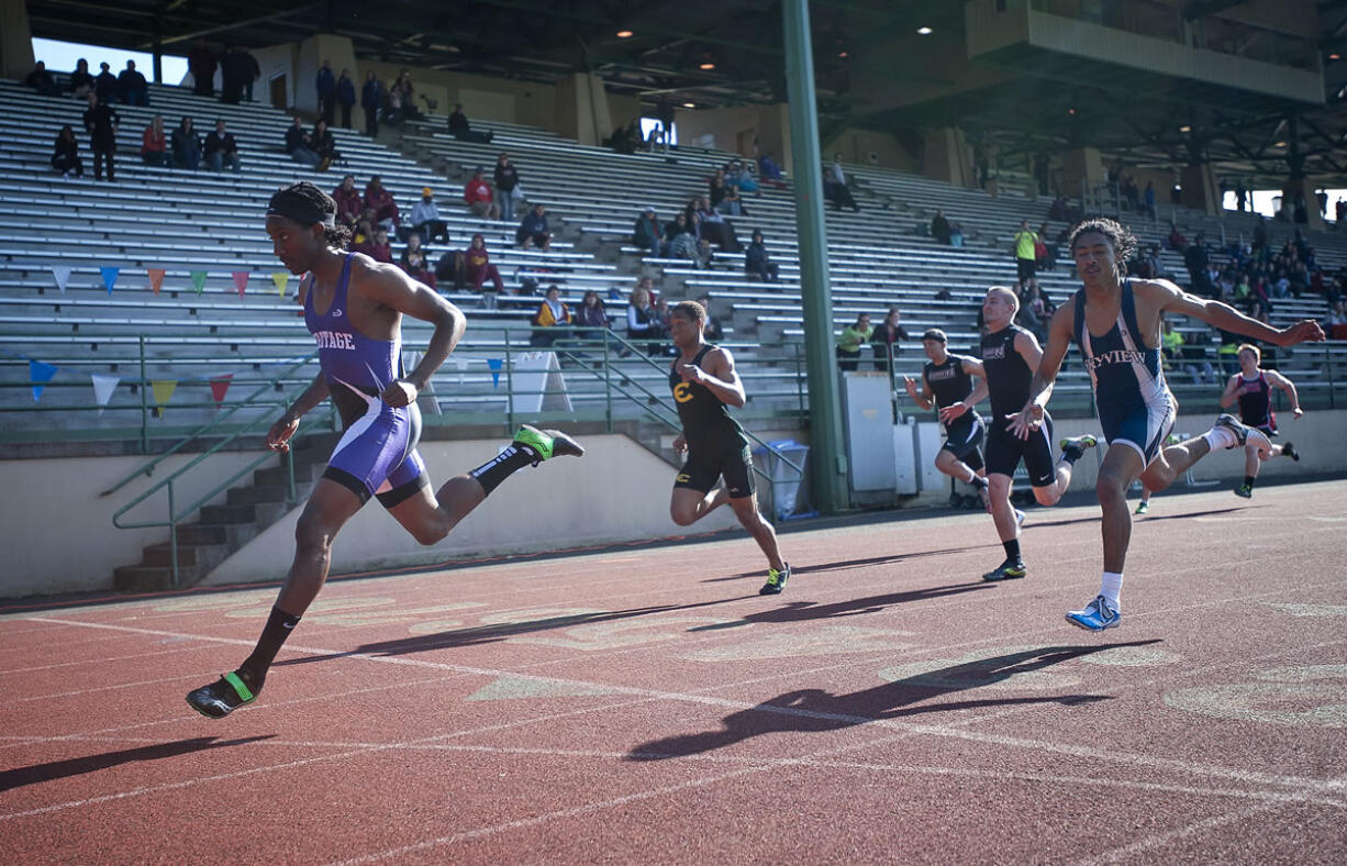 Heritage sophomore E'Lon Mack is first in the boys 4A 200 meters.