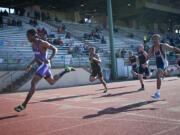 Heritage sophomore E'Lon Mack is first in the boys 4A 200 meters.