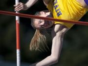 Columbia River's Jennifer DeBellis clears 11 feet on her way to a mark of 12 feet even to win the girls pole vault title.