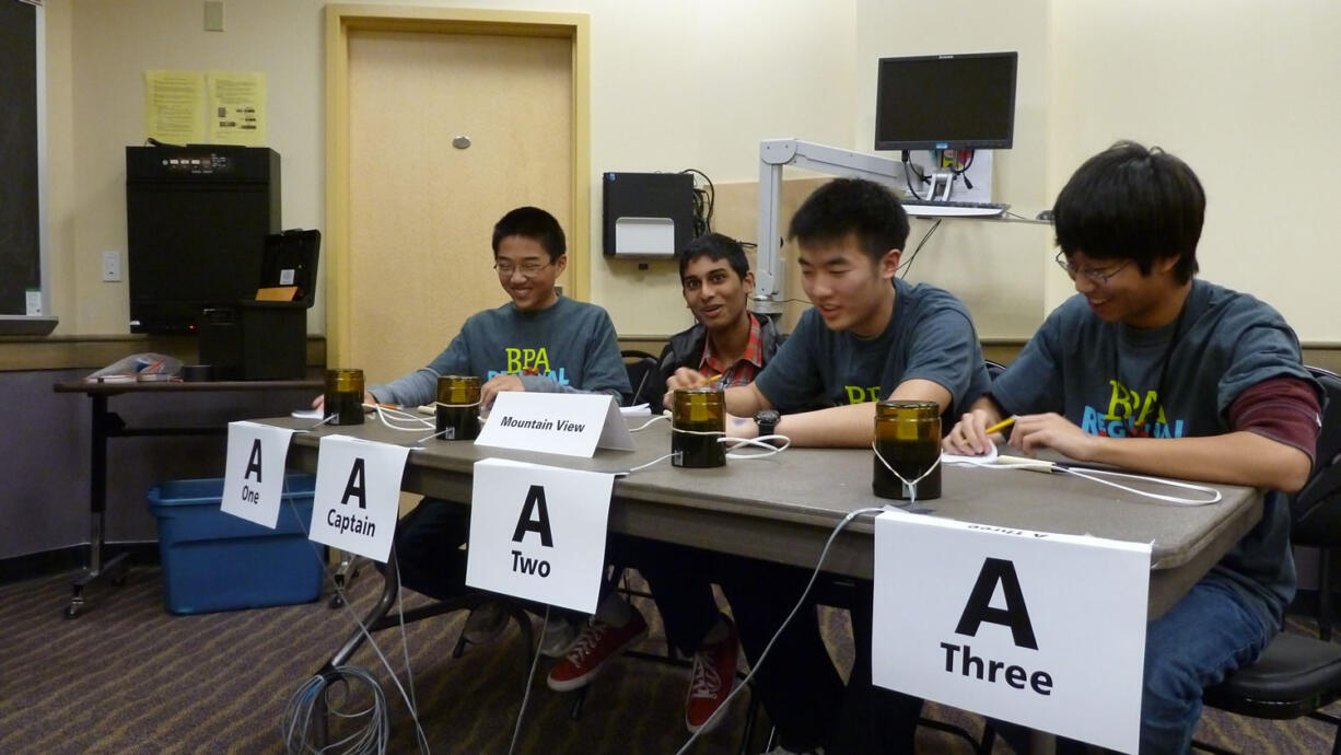 Members of a the Mountain View High School team - left to right, Peter Lu, freshman, Rohi Nagari, junior, Marcus Kwon, junior, Jason Liu, sophomore, and not pictured, Waverley He, sophomore, compete Saturday in the BPA Regional Science Bowl.