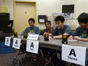 Members of a the Mountain View High School team - left to right, Peter Lu, freshman, Rohi Nagari, junior, Marcus Kwon, junior, Jason Liu, sophomore, and not pictured, Waverley He, sophomore, compete Saturday in the BPA Regional Science Bowl.