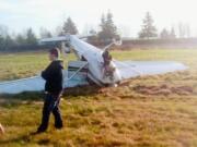 Cowlitz 2 Fire and Rescue
A Woodland man was unhurt when his plane was flipped by a crosswind while landing at an airport in Kelso.