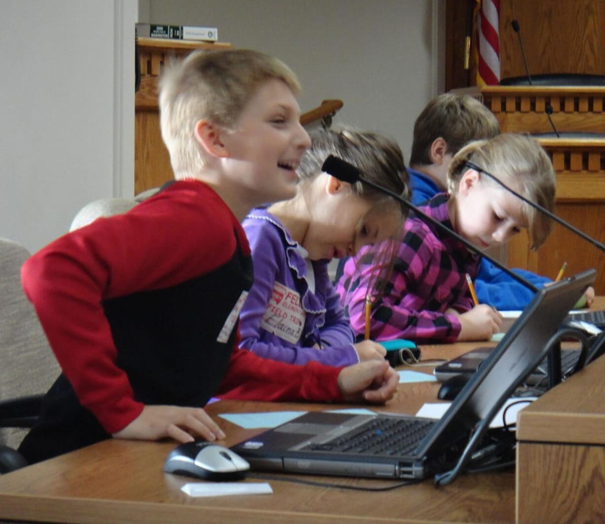 Felida: 
 Students Ethan Hill, from left, Elaina Baker, Lizzy Dunlop and Christian Fletcher debate in the mock debate in one of the legislative buildings at the Capitol in Olympia.