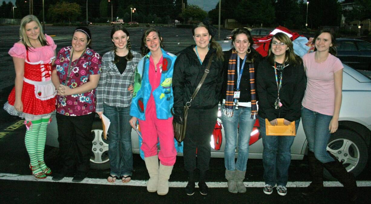 Barberton: 
 Prairie High School Red Cross student volunteers participate in 'Trick or Treat for Disaster. 'From left: Kylie Brown, Miranda Steiner, Chloe Barnes, Gabby Oliber, Lauren Morris, Zoe Lovell, Kelsi Edmonds and Meghan Labadie.