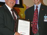 Fourth Plain Village: Dennis Rugg, left, was named Volunteer of the Year by the American Red Cross Southwest Washington chapter.