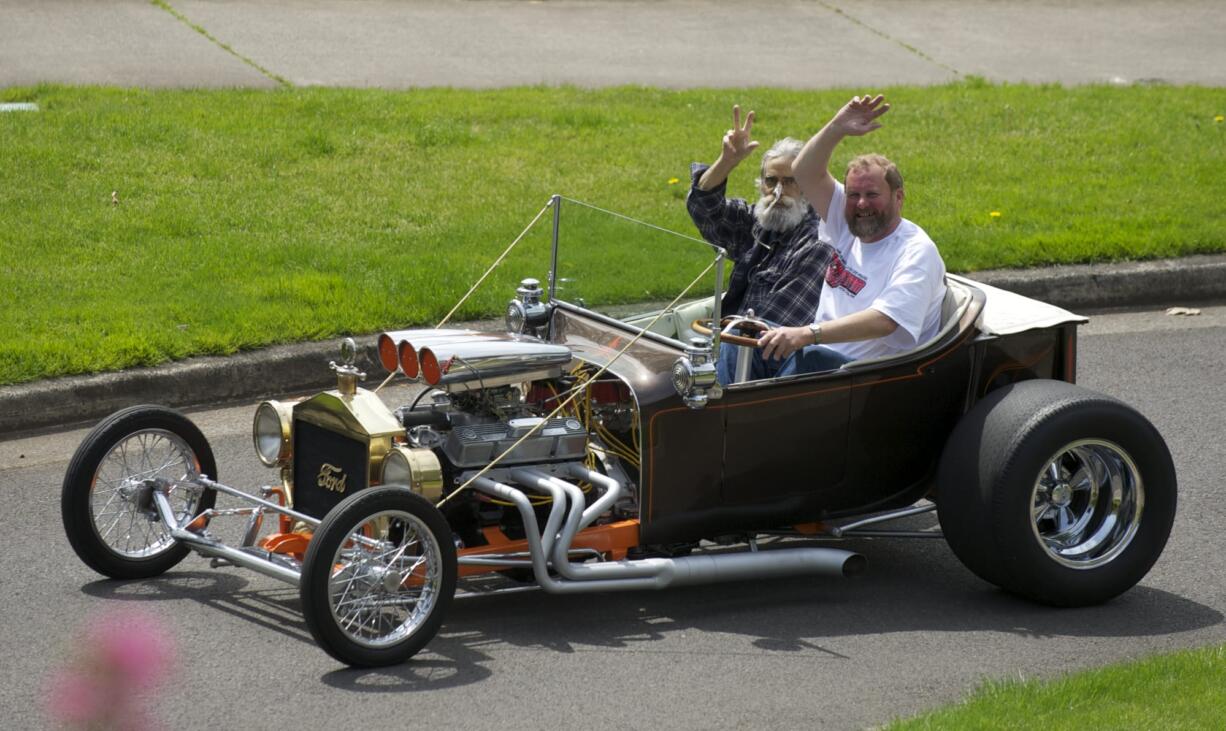 Bill Keller, left, was delighted to take a ride with his buddy Dale Vermeire.