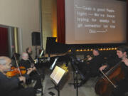 Vancouver Symphony Orchestra musicians accompany a silent film comedy Sunday afternoon at Kiggins Theatre in Vancouver.