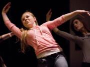 Haley Van Nortwick from Vancouver School of Arts and Academics rehearses a dance routine, which students from the magnet arts school learned in less than one hour and performed with professional Broadway actors Monday.