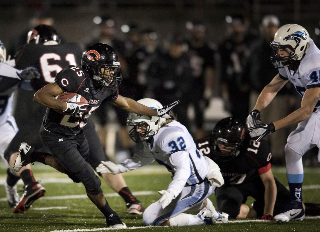 Camas' Zach Marshall runs against Meadowdale in the second half of their 3A quarterfinal playoff game at Doc Harris Stadium on Saturday.