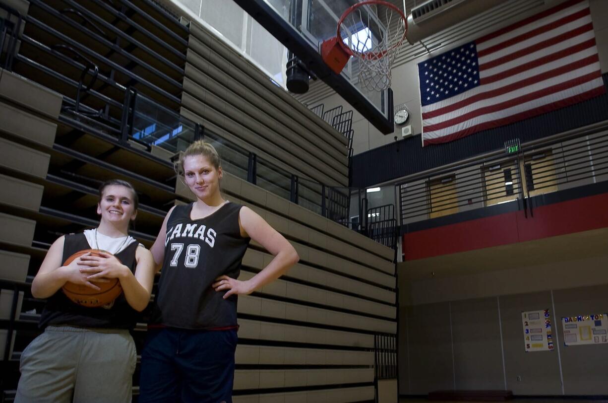 Exchange student Jenka Stiasna, right, poses for a portrait with her &quot;host sister&quot; Kendra Preuninger at Camas High School on Tuesday.