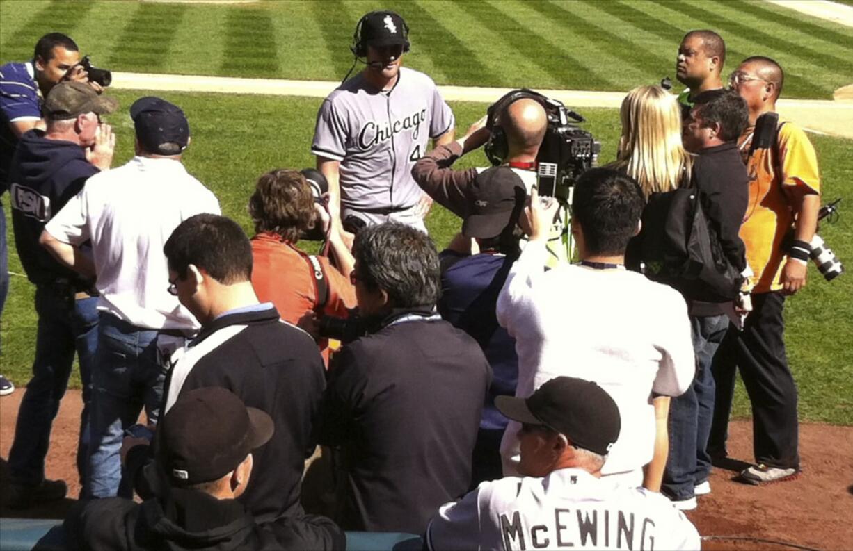 Chicago White Sox pitcher Phil Humber speaks to the media after throwing only the 21st perfect game in major league history April 21 against the Seattle Mariners at Safeco Field in Seattle.