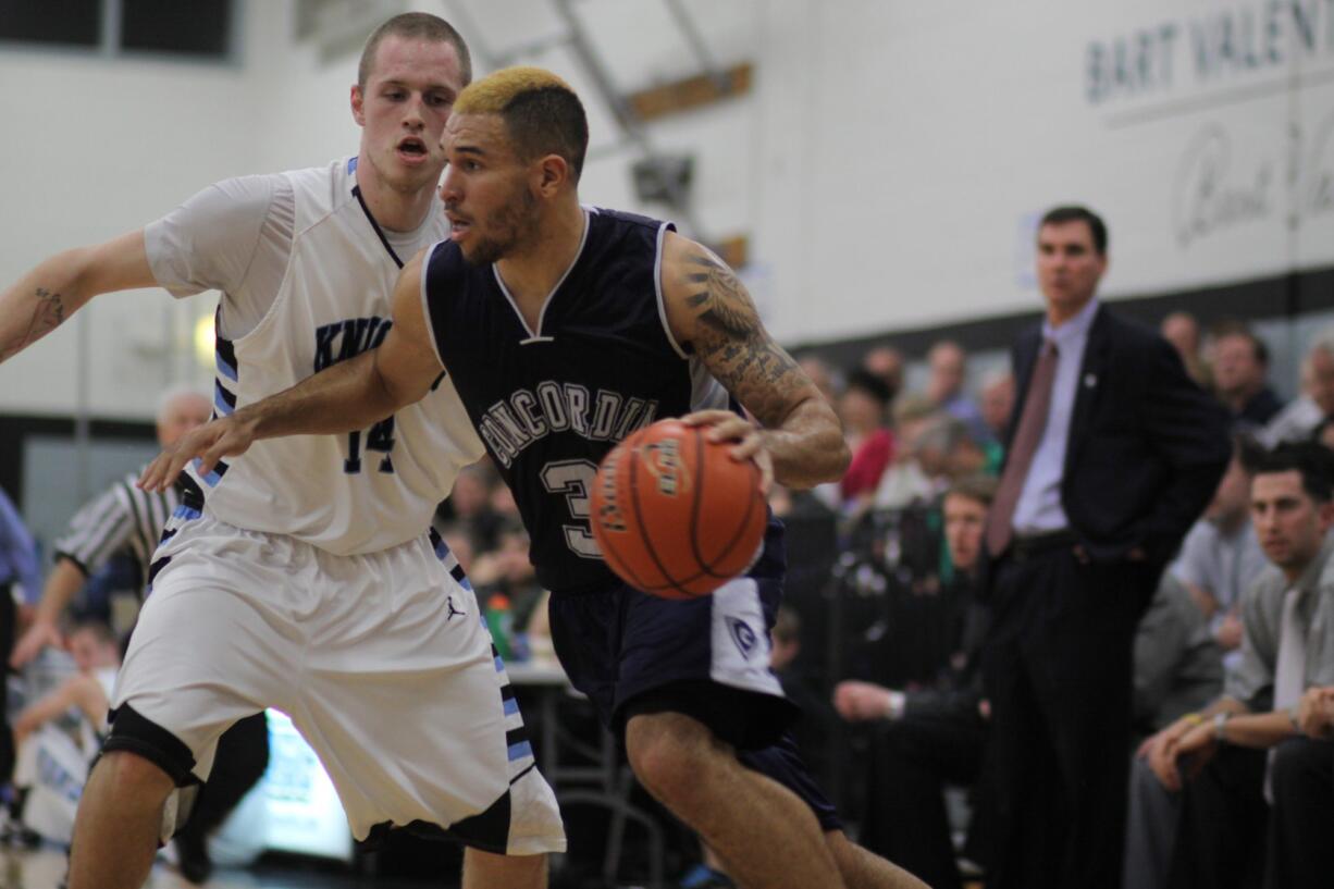 Prairie High School graduate Kevan West, right, is one of four Clark County products on the Concordia roster.