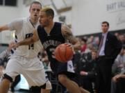 Prairie High School graduate Kevan West, right, is one of four Clark County products on the Concordia roster.