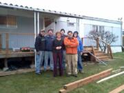 Northeast Hazel Dell: Volunteers from Lowe's and Habitat for Humanity's A Brush with Kindness program replaced Le Phare Community Help Center founder Cecile Roth's deck.