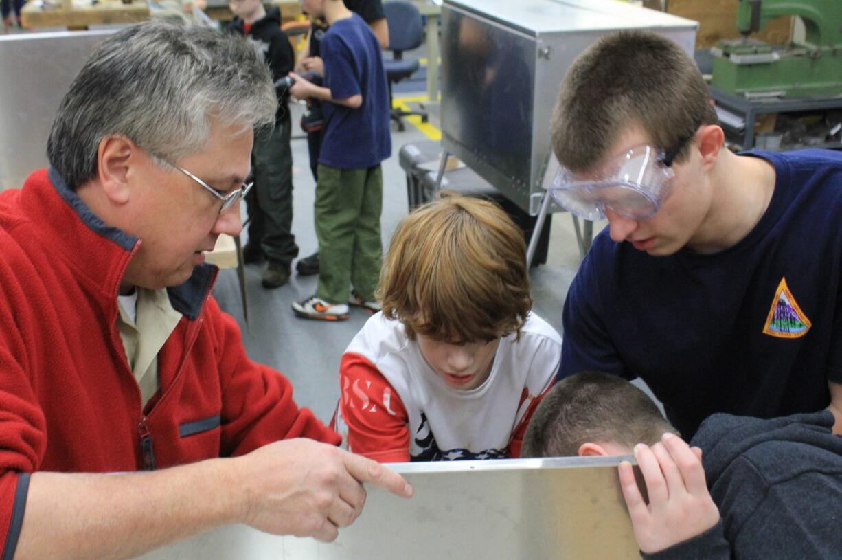 Salmon Creek: Volunteers from Vancouver's Smith-Root Inc. helped members of Boy Scout Troop 14 to build eight patrol boxes.