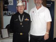 Battle Ground: George Bennett, left, chief radio man, patrol wing 2 VP 21 squadron, a Pearl Harbor survivor, and Battle Ground Elks Lodge Exalted Ruler Larry Childress, U.S.