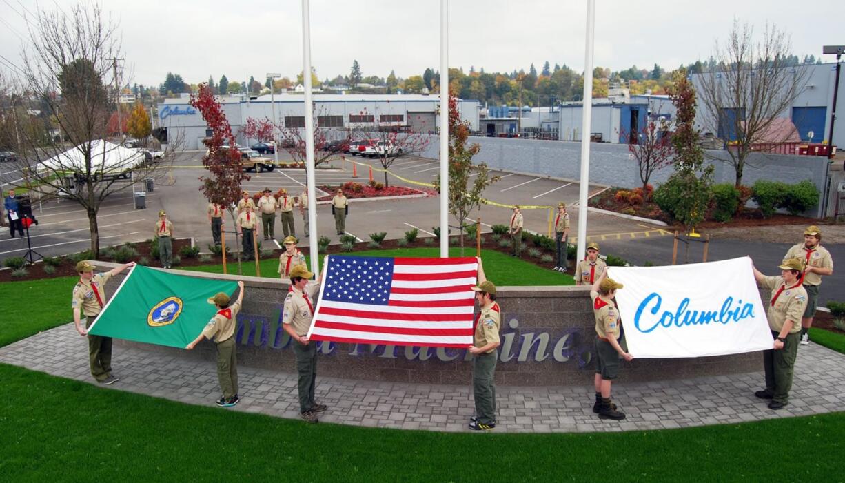 Hudson's Bay: Boy Scout Troop 328 assists in a flag pavilion dedication on Veterans Day at Columbia Machine Inc.