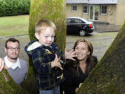 Two-year-old Zephyr Thackeray shows off his new climbing tree with the help of his parents, Ian Thackeray, left, and Tara Thackeray, right, in the back yard of their newly purchased Vancouver starter home.