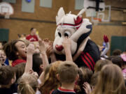 Portland Trail Blazers mascot Blaze thrilled students at Felida elementary school during a visit Wednesday.