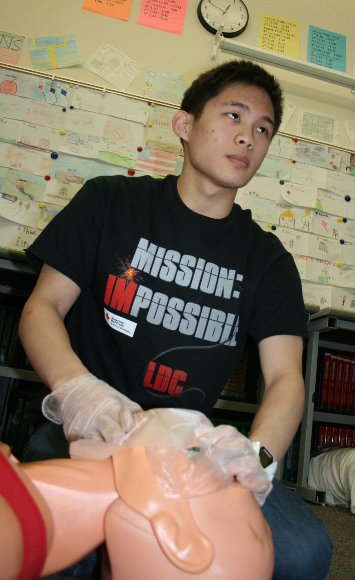 Felida: Kelvin Fang practices CPR at the American Red Cross Youth Council's Leadership Development Conference at Thomas Jefferson Middle School on March 3-4.