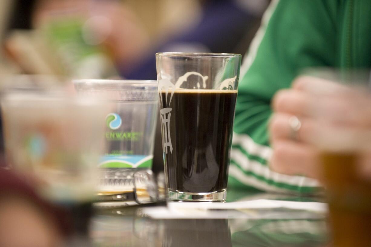 Customers drink stout at Mt. Tabor Brewing in Vancouver.