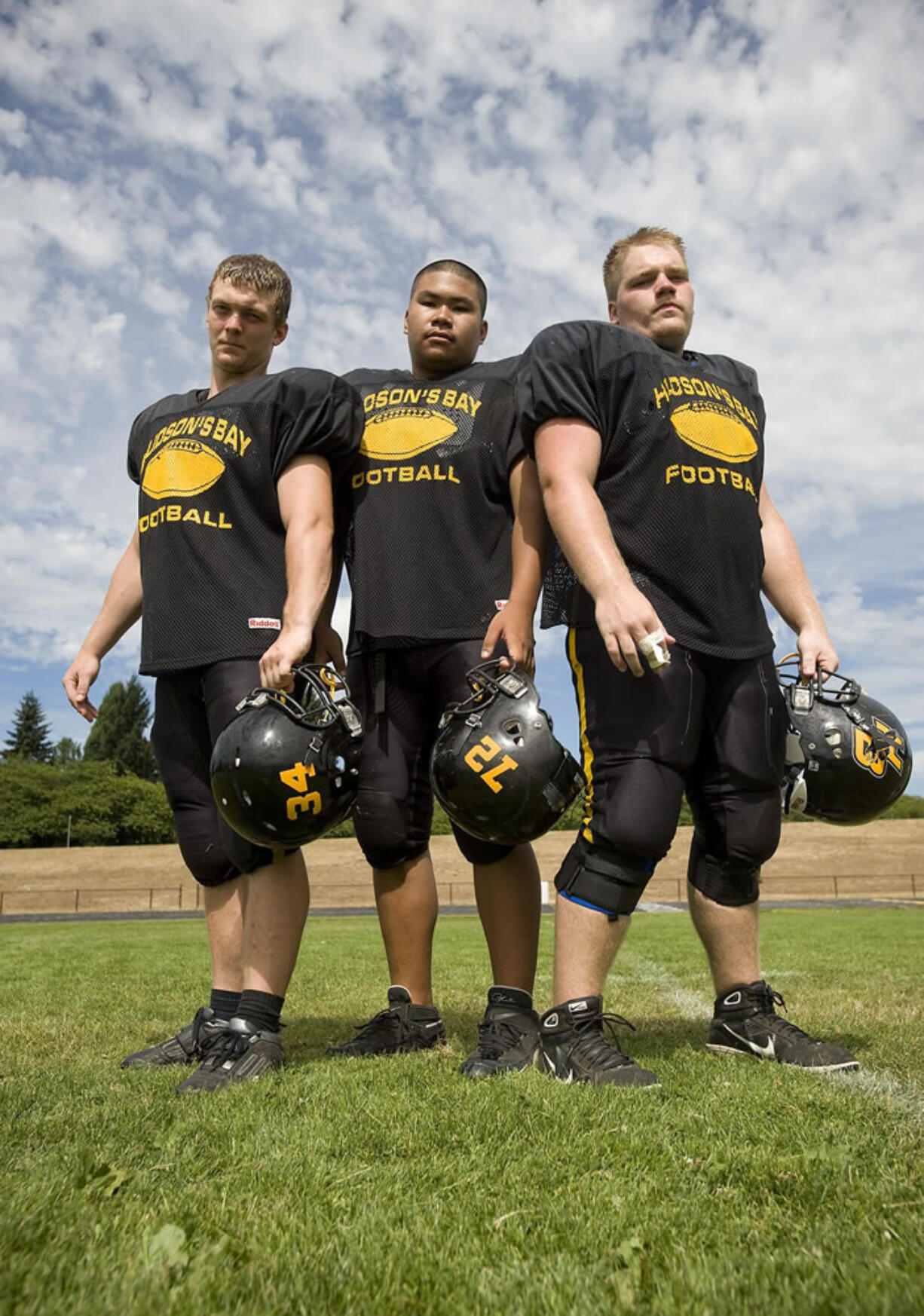 Josh Friedli, left, Mike Devera and Josh Ingebretson have dedicated themselves to Hudson's Bay football and hope the program takes off long after they are done playing.