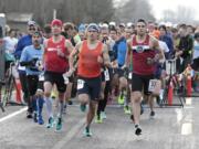 Left to right, Peter Bromka, Patrick Reaves and Chris Platano at the start of the Vancouver Lake Half Marathon.