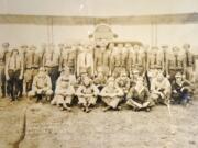 Men of the Army&#039;s 321st Observation Squadron in the 1920s, assembled in front of a DH-4 Liberty at Pearson Field.