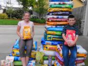 Felida: Alicia Wallingford, a fifth-grader at Felida Elementary School, and her brother, Jared, a third-grader, held their annual Julie Reamer Memorial Pet Food Drive in April and collected 800 pounds of food.