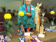 Hudson's Bay: Loraine Allinger of Hockinson won seven awards at Vancouver Chrysanthemum Society's annual flower show in Vancouver.