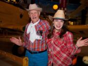 Hudson's Bay: Pat Sutherland, left, a volunteer at the Pearson Air Museum, and Nicole Knotts, an employee at the Fort Vancouver visitor center bookstore, pose at Pearson's Aviation Harvest Day celebration on Oct.