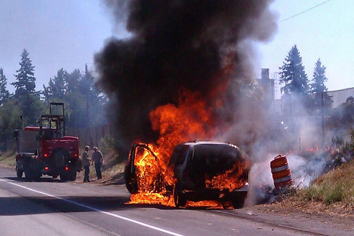 A minivan driver was taken to a hospital with burns Friday afternoon after his car hit a metal shaft that fell from a semi truck on Interstate 5 southbound in Salmon Creek.