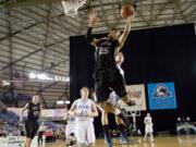 Union's Jordan Chatman drives to the rim against Central Valley at the 4A Boys State Basketball Tournament in Tacoma, Friday, March 2, 2012.(Steven Lane/The Columbian)