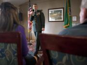 Zachary Kaufman/The Columbian
Col. Daniel Kern sings to honor three World War II veterans who live at Mountainview House Assisted Living in Camas.