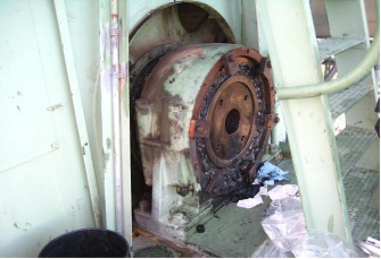 The trunnion rests atop the southeast tower of the Interstate 5 Bridge's northbound span.