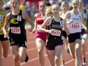 Union's Alexis Fuller, center, leads the way in the girls 800-meter race. Fuller won the event in 2:13.69.