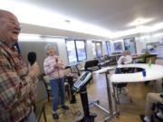 Lenard and Faye Davis entertain a group of seniors at Vancouver's Caretique memory care facility. Faye was diagnosed with Alzheimer's disease in 2006. Lenard uses the performances as an opportunity to relieve stress and keep their minds off the disease.