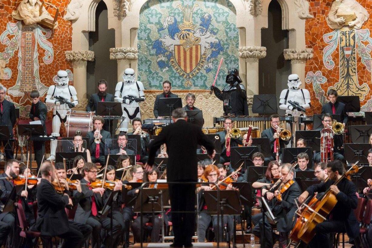 Salvador Brotons conducts the music of &quot;Star Wars&quot; at Barcelona&#039;s spectacular Palau de la M?sica Catalana while Darth Vader and some stormtroopers try to keep everyone in line.